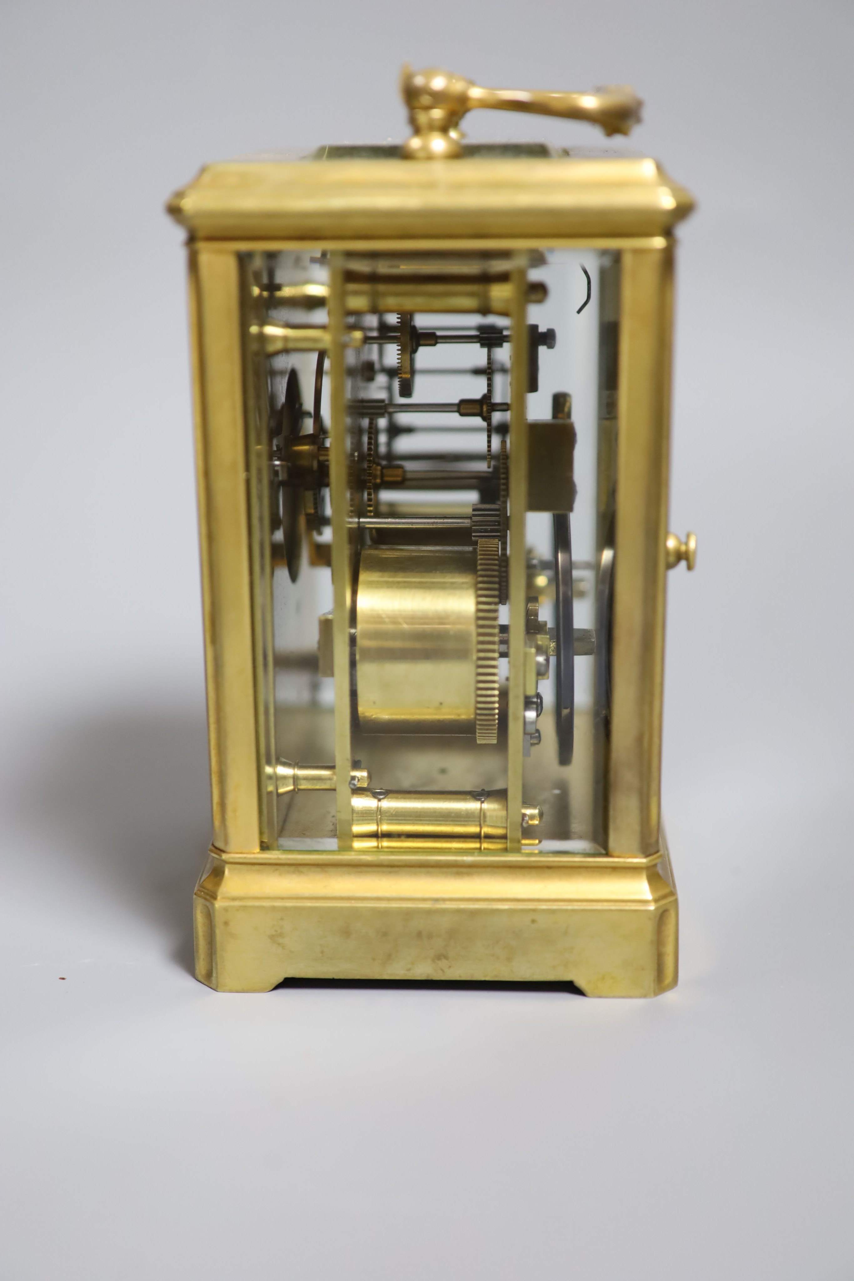 An early 20th century lacquered brass carriage clock, cased